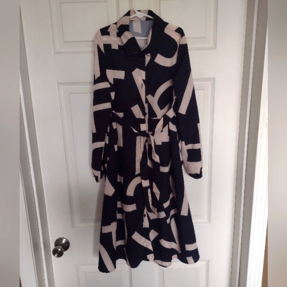 Girls dress, size 10. 36 in. Has pockets!